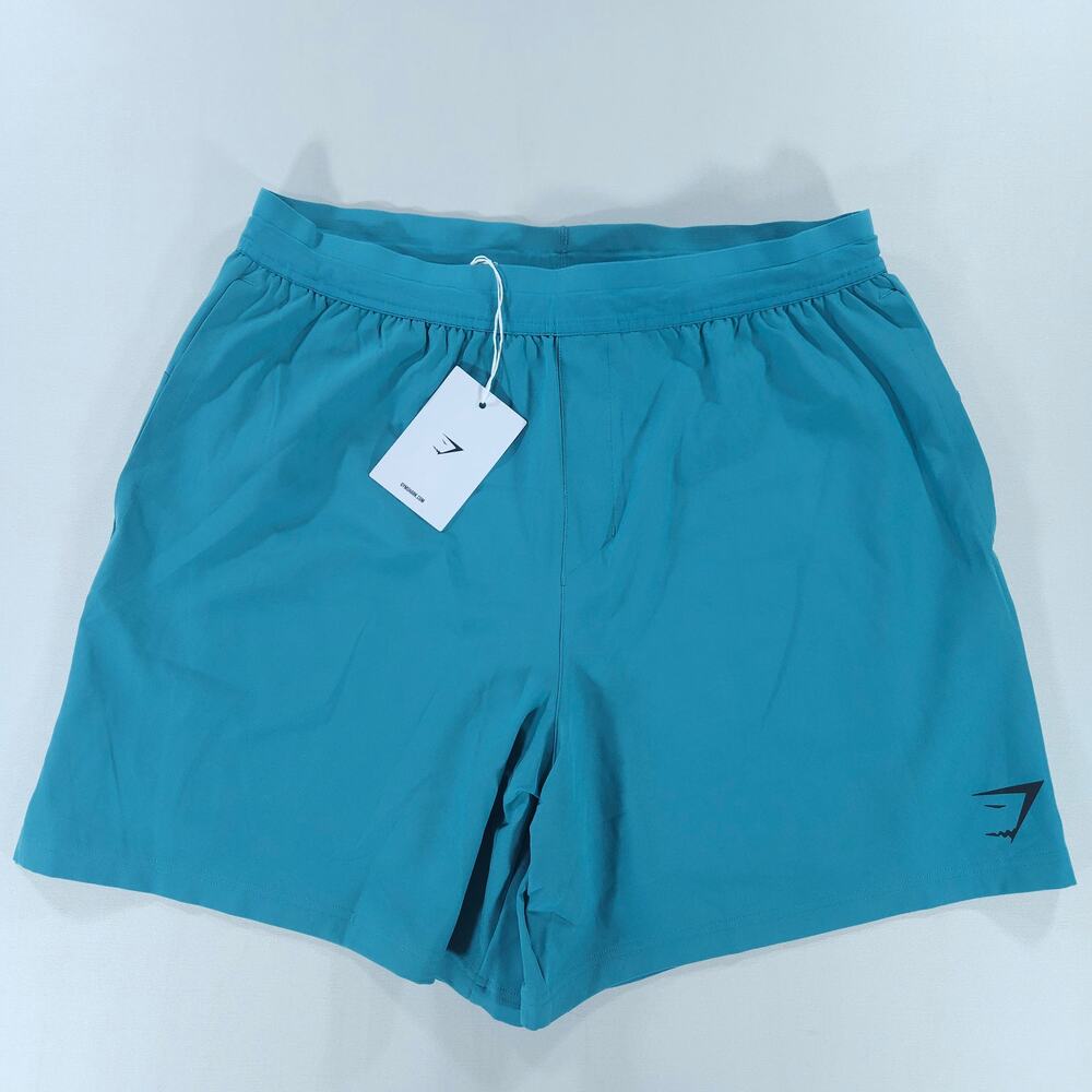 Gymshark Land to Water 6" Shorts NWT Men M Teal Slim Fit Swim Hybrid Athletic